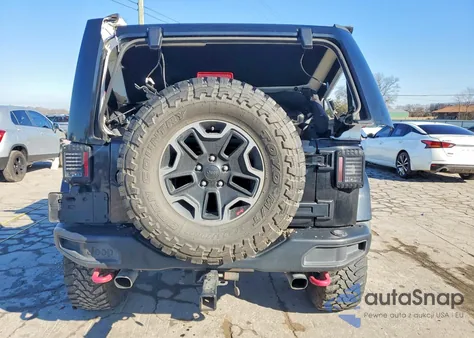 2015 Jeep Wrangler Unlimited Rubicon z USA, uszkodzony, nr VIN 1C4HJWFG8FL724713